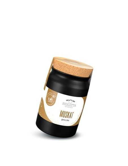 Schwarzes Keramiktöpfchen mit beige-weißem Etikett mit der Aufschrift „MUSKAT“.