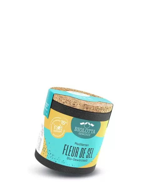Bio-Pappdose mit türkis-gelbem Etikett mit der Aufschrift „FLEUR DE SEL“.