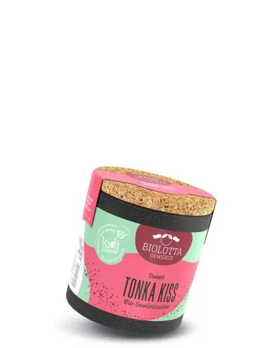 Bio-Pappdose mit türkis-rosafarbenem Etikett mit der Aufschrift „TONKA KISS“.