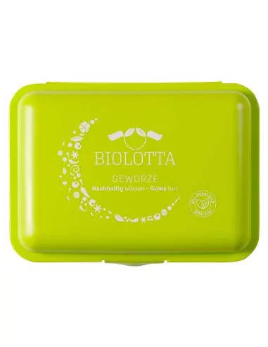 Grüne Brotdose mit weißem Biolotta-Logo und Mondmotiv auf dem Deckel, geschlossen von oben fotografiert.