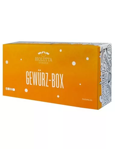 Orangefarbene Geschenkbox mit weißem Muster und der Aufschrift „Gewürz-Box“