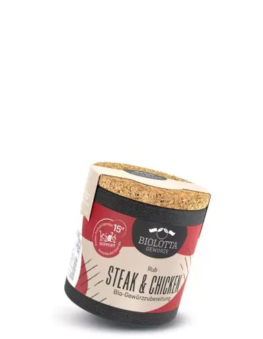 Bio-Pappdose mit grün-violettem Etikett mit der Aufschrift „Steak & Chicken“