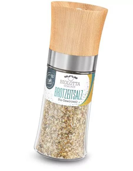 Mühle mit heller Bio-Brotsalzkräutermischung und türkis-grünem Etikett.