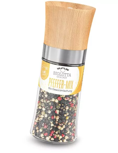 Bio-Mühle mit Holzdeckel, durchsichtigem Glas und gelbem Etikett mit der Aufschrift „PFEFFER-MIX"