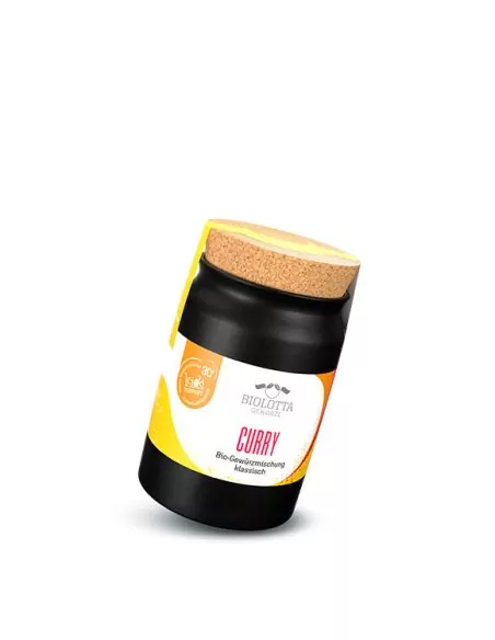 Schwarzes Keramiktöpfchen mit gelb-weißem Etikett mit der Aufschrift „CURRY“