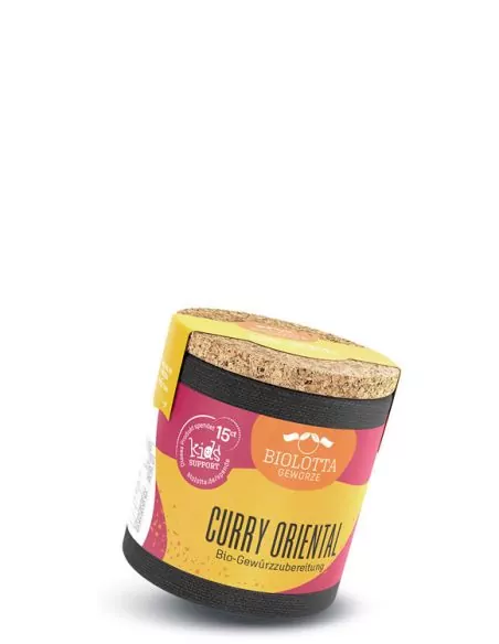 Bio-Pappdose mit gelb-pinkem Etikett mit der Aufschrift „CURRY ORIENTAL“