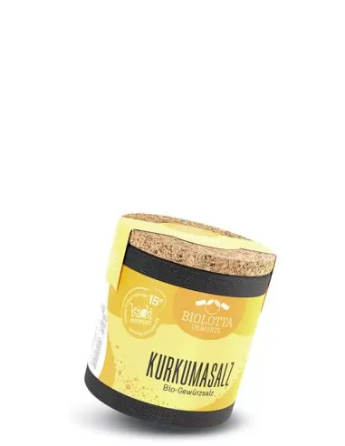 Bio-Pappdose mit gelbem Etikett mit der Aufschrift „KURKUMASALZ“