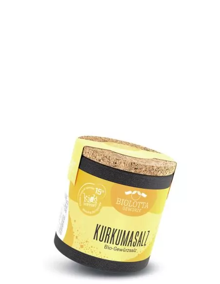 Bio-Pappdose mit gelbem Etikett mit der Aufschrift „KURKUMASALZ“