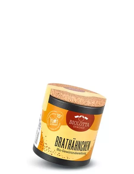 Schwarze Pappdose mit orange-gelbem Etikett mit der Aufschrift Brathähnchen – Bio-Gewürzzubereitung