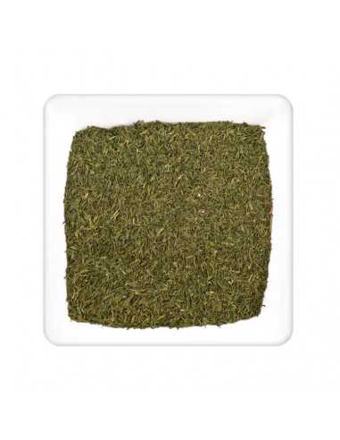 Fein geschnittene, getrocknete Dillspitzen flächig in einer weißen, quadratischen Schale verteilt. Fein geschnittene, getrocknete Dillspitzen flächig in einer weißen, quadratischen Schale verteilt.