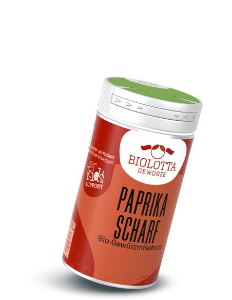 Gewürzstreuer mit rot-orangenem Etikett mit der Aufschrift Paprika scharf, Bio-Gewürzmischung