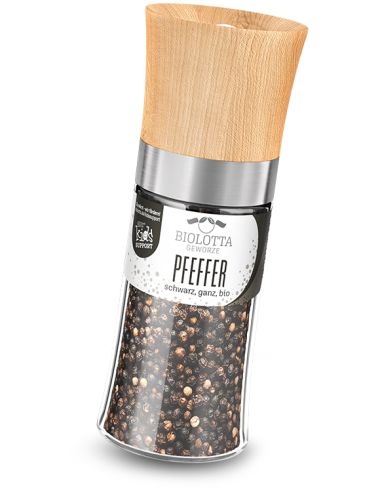Transparente Gewürzmühle mit schwarzem Etikett mit der Aufschrift „PFEFFER schwarz, ganz, Bio“ und Holzdeckel.