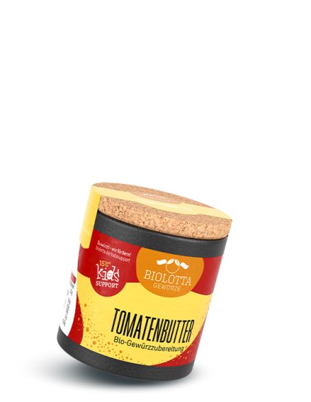 Schwarze Pappdose mit gelb-rotem Etikett mit der Aufschrift Tomatenbutter, Bio-Gewürzzubereitung