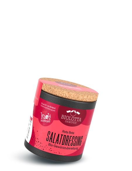 Schwarze Pappdose mit pink-rotem Etikett mit der Aufschrift Salatdressing Rote Bete, Bio-Gewürzzubereitung