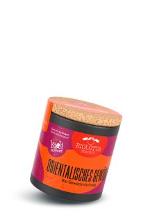Schwarze Pappdose mit orange-pinkem Etikett mit der Aufschrift Orientalisches Gewürz, Bio-Gewürzmischung