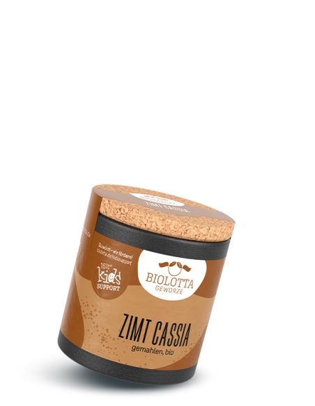 Schwarze Pappdose mit braunem Etikett mit der Aufschrift Zimt Cassia, gemahlen, bio