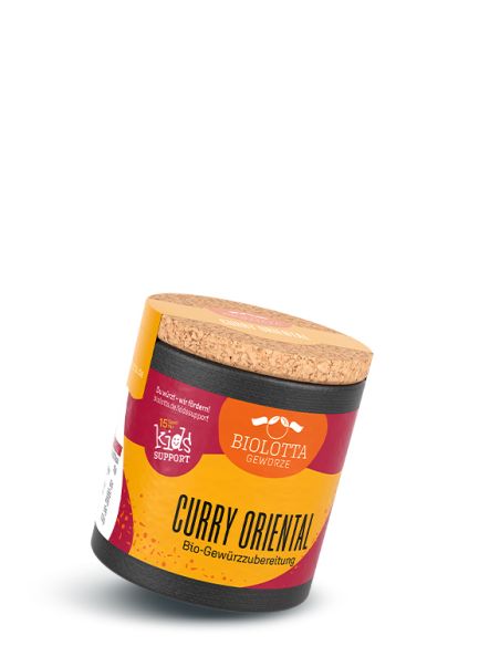 Schräge, zylindrische Pappdose mit gelb-pinker Gestaltung und Korkdeckel, vorn beschriftet mit "Curry Oriental".