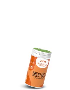 Dose Biolotta Chiliflake geschrotet, bio, mit orangefarbenem Etikett und grünem Deckel.
