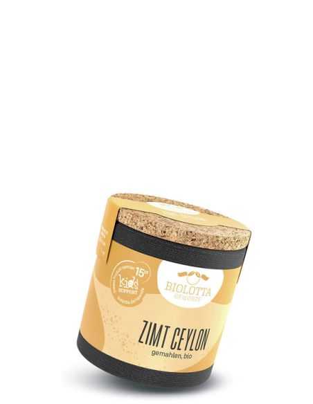 Schwarze Pappdose mit beigem Etikett mit der Aufschrift Zimt Ceylon, gemahlen, bio