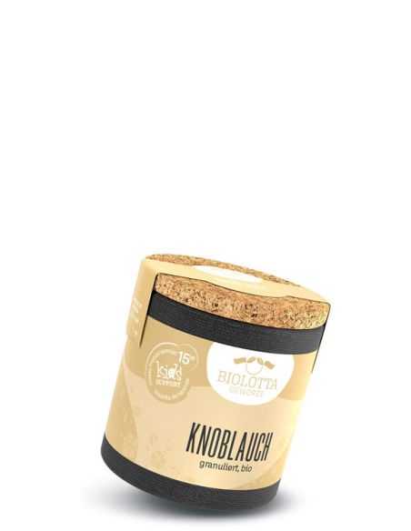 Beige Pappdose mit schwarzem Boden und Korkdeckel, darauf steht „Knoblauch, granuliert, bio“.