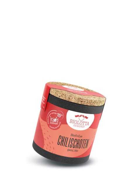 Rote Pappdose mit Korkdeckel, Biolotta-Etikett und Aufschrift „Bird's Eye Chilischoten ganz, bio“.