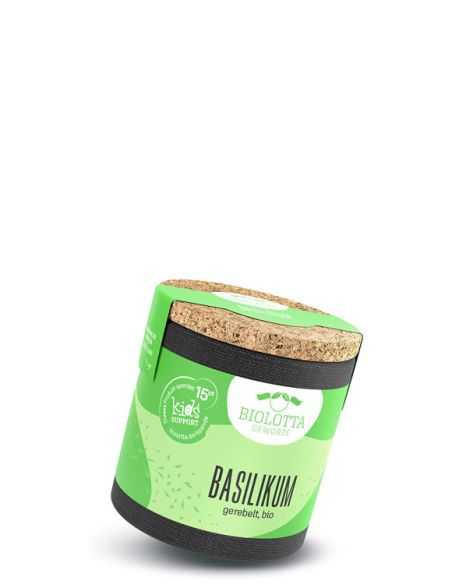 Schräge grüne Pappdose mit Korkdeckel und schwarzem Boden, Etikett mit Aufschrift „Basilikum, gerebelt, bio“.