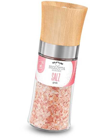 Transparente Gewürzmühle mit rosa Etikett mit der Aufschrift „SALZ grob“ und Holzdeckel.